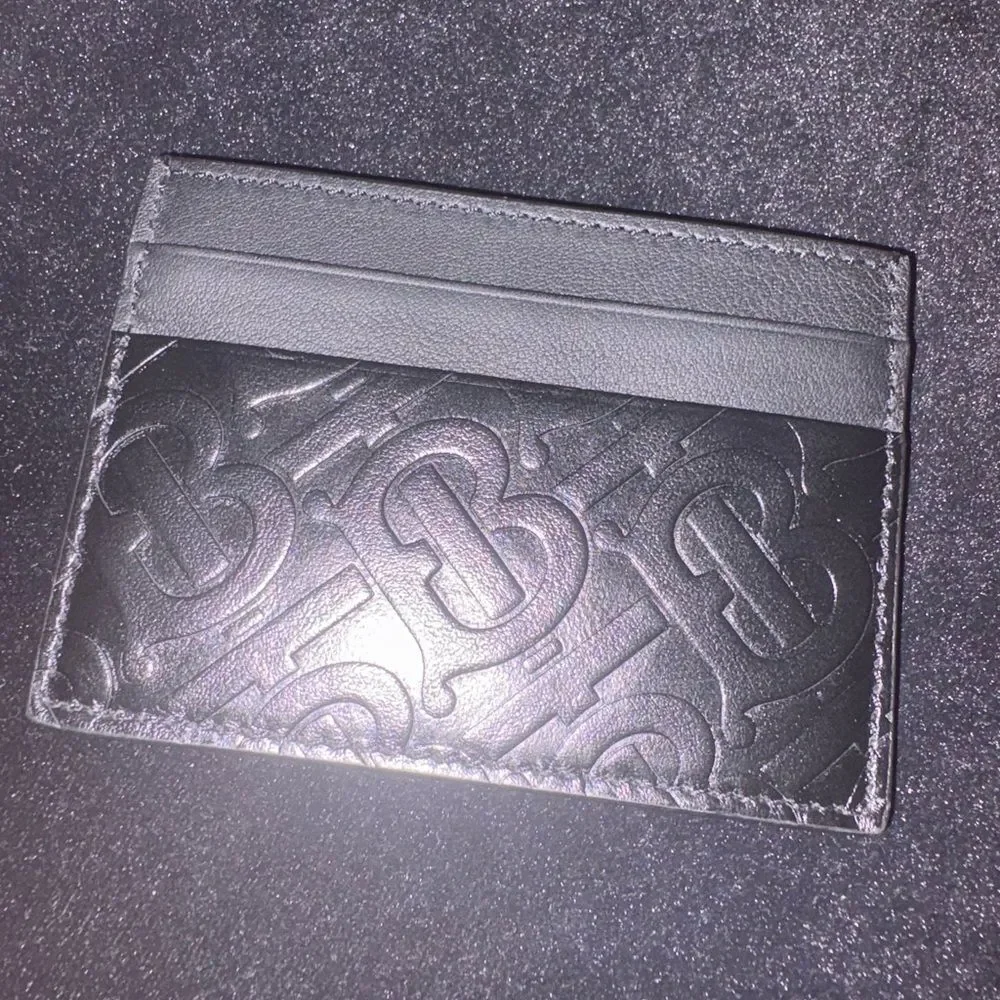 Brand new black Burberry  Embossed Leather Card Holder with authenticity  cert
